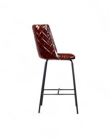 Modern bar stool with glossy dark brown faux leather upholstery, quilted side detailing, and slender black metal legs with a footrest, ideal for kitchen islands or contemporary home bars