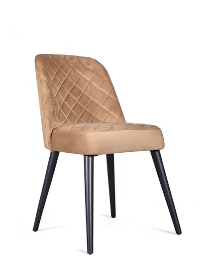 Modern armless beige dining chair with cushioned seat, curved backrest, and black metal legs