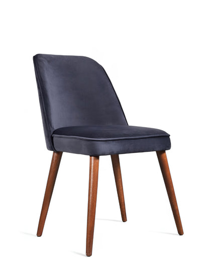 Modern armless dark blue dining chair with cushioned seat, curved backrest, and wooden legs