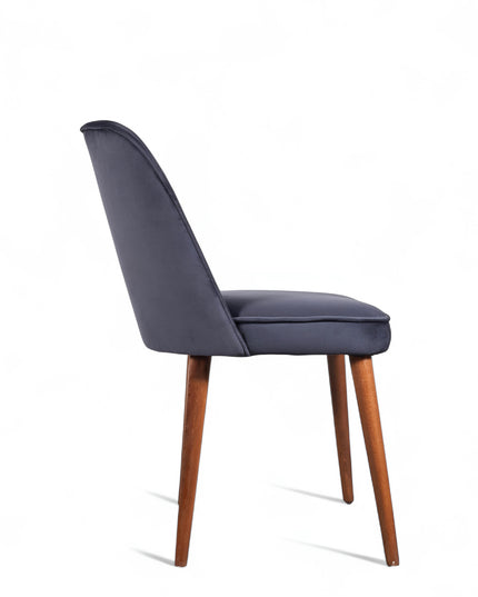 Modern armless dark blue dining chair with cushioned seat, curved backrest, and wooden legs