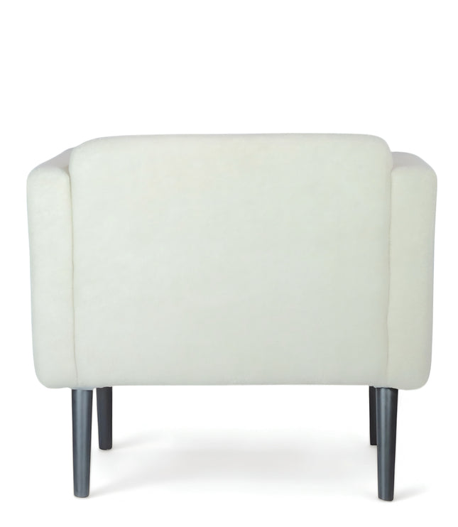 Modern white boucle armchair with black tapered legs and sculpted arms — minimalist accent lounge chair for cozy contemporary living rooms or bedrooms