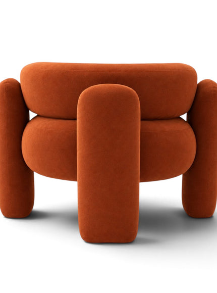 A modern, rounded accent chair upholstered in a textured burnt orange velvet fabric, shown from a front-facing perspective on a clean white background.