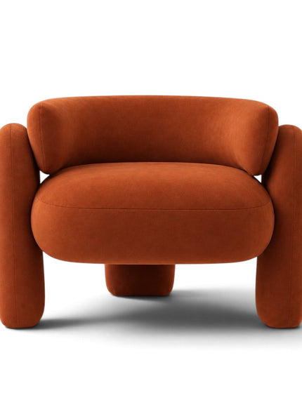 A modern, rounded accent chair upholstered in a textured burnt orange velvet fabric, shown from a front-facing perspective on a clean white background.