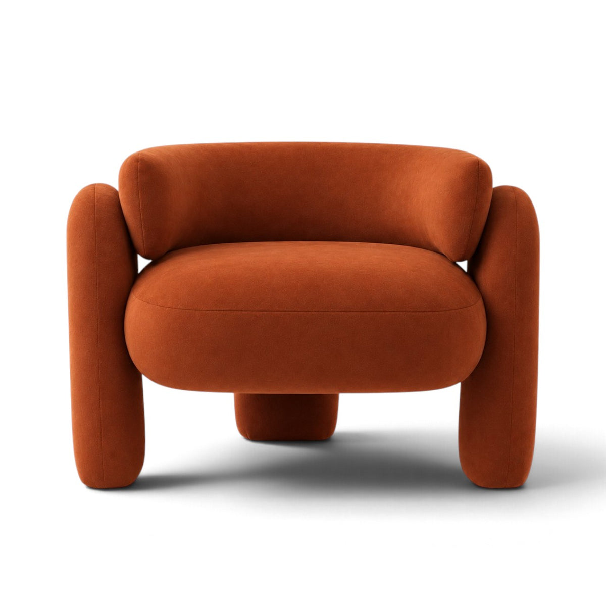 A modern, rounded accent chair upholstered in a textured burnt orange velvet fabric, shown from a front-facing perspective on a clean white background.