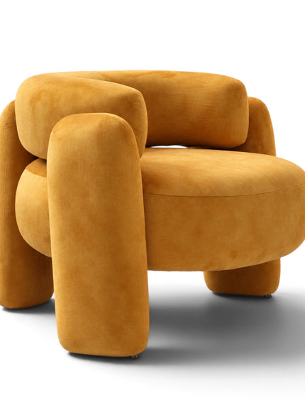 A modern, rounded accent chair upholstered in a textured mustard-yellow velvet fabric, shown from a front-facing perspective on a clean white background.