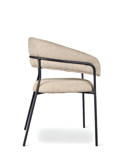 Minimalist upholstered chair with curved backrest and black open-frame metal legs

