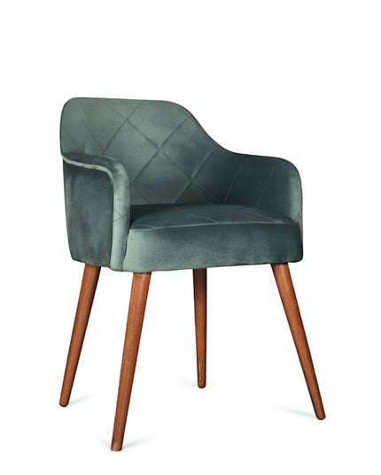 Upholstered green armchair with diamond stitching, enclosed sides, and tapered wooden legs