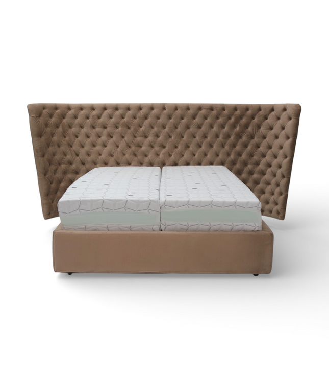 Brown upholstered bed with a mattress on a white background