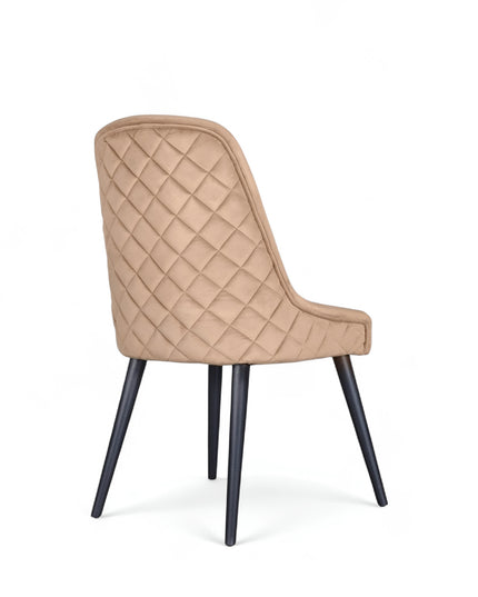 Modern dining chair with beige curved backrest and angled black legs