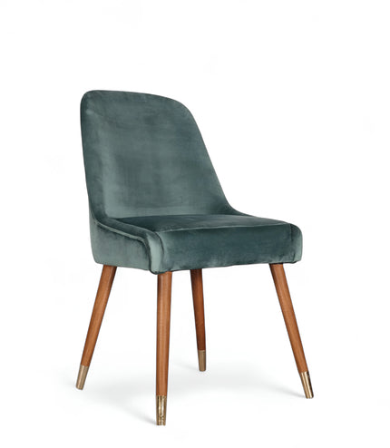 Modern dining chair with brue/gray curved backrest and angled wooden legs with golden tips