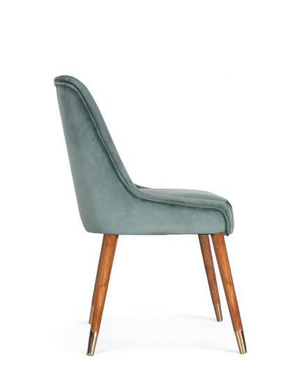 Modern dining chair with brue/gray curved backrest and angled wooden legs with golden tips