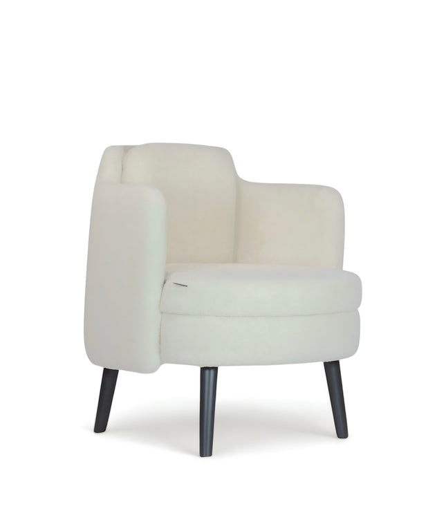 Ivory boucle Ribbon Armchair with flared arms, rounded seat, and black tapered legs, shown from front and side angles.