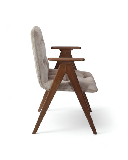 Mid-century modern lounge chair with taupe tufted upholstery and angled solid wood frame, ideal for living rooms or reading nooks.