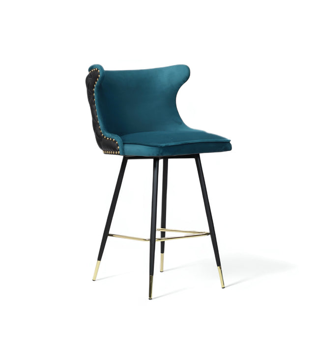 Modern bar stool with a sculpted teal velvet seat and high backrest, featuring black tufted faux leather on the outer back, brass nailhead trim, and slim black metal legs with gold accents and a footrest-ideal for kitchen islands or stylish bar areas