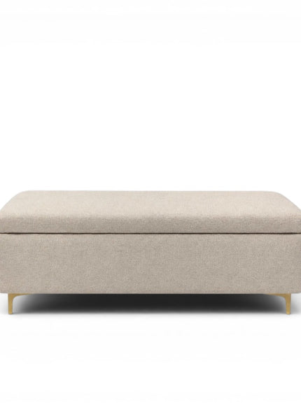 Beige storage ottoman on a white background