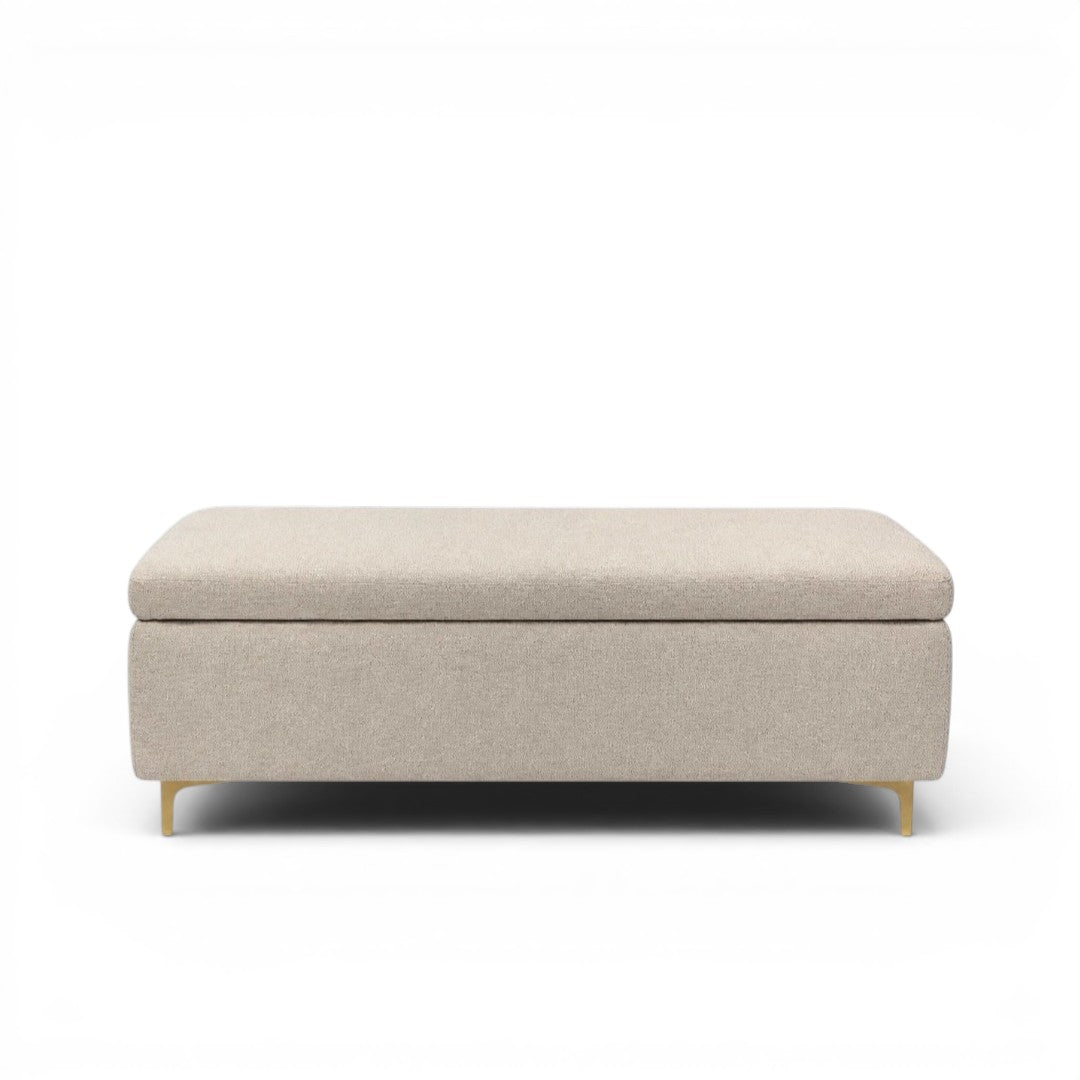 Beige storage ottoman on a white background