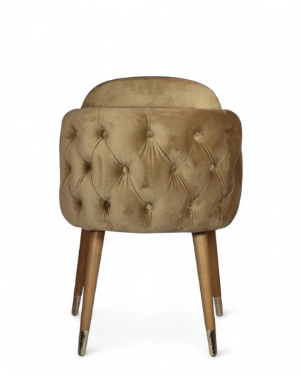 Beige dining chair with wooden legs on a white background