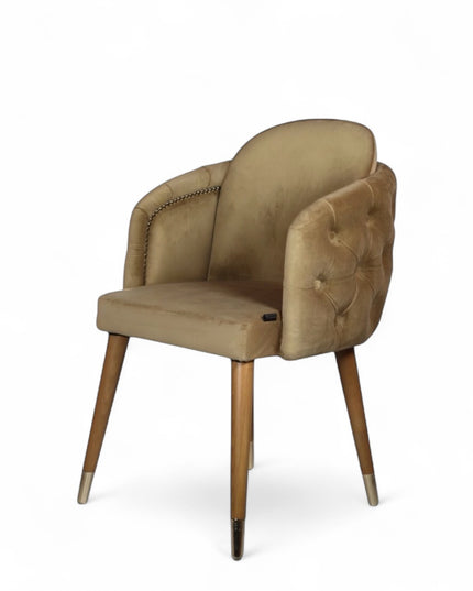 Beige dining chair with wooden legs on a white background