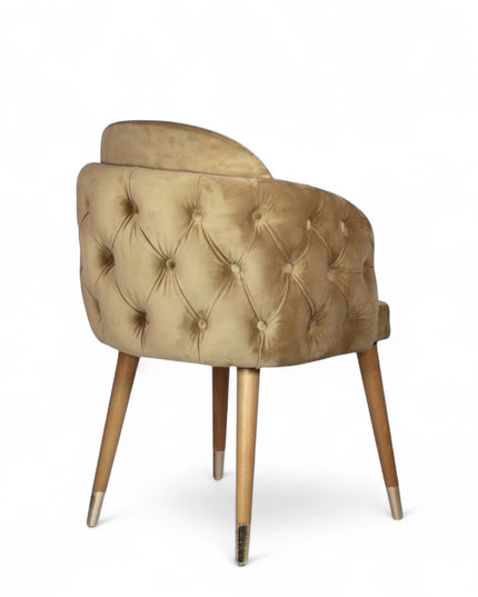 Beige dining chair with wooden legs on a white background