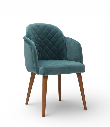 Teal velvet chair with quilted backrest on a white background