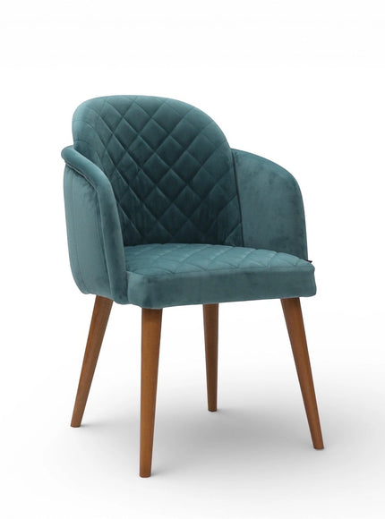 Teal velvet chair with quilted backrest on a white background
