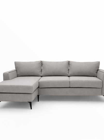 light gray fabric sectional sofa, highlighting the textured upholstery, plush back cushion, and clean stitched seams under soft, even lighting.