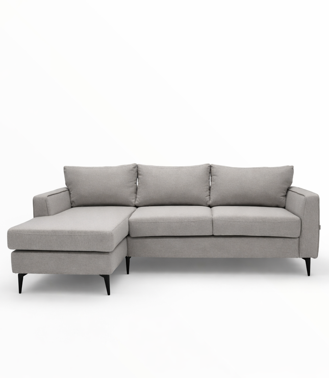 light gray fabric sectional sofa, highlighting the textured upholstery, plush back cushion, and clean stitched seams under soft, even lighting.