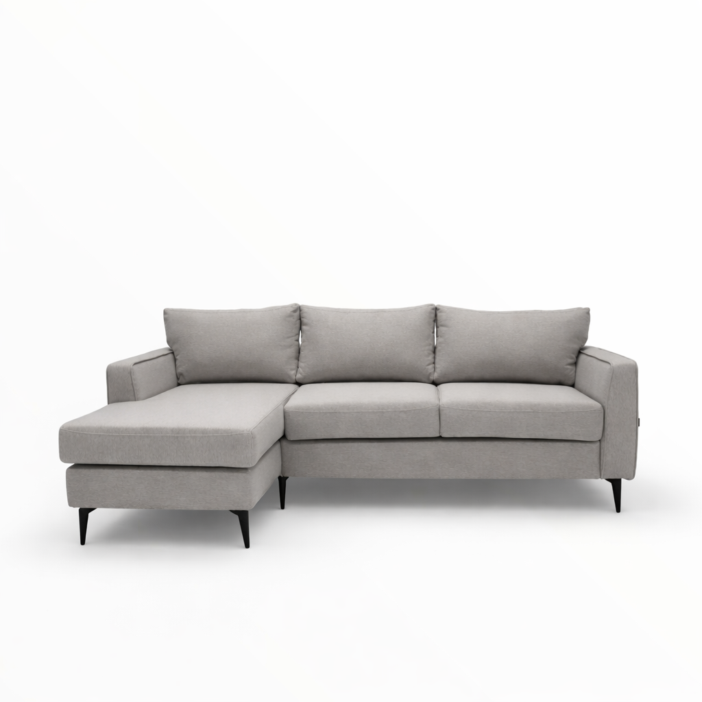 light gray fabric sectional sofa, highlighting the textured upholstery, plush back cushion, and clean stitched seams under soft, even lighting.