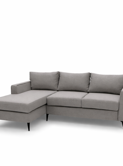 light gray fabric sectional sofa, highlighting the textured upholstery, plush back cushion, and clean stitched seams under soft, even lighting.