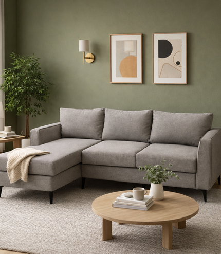 light gray fabric sectional sofa, highlighting the textured upholstery, plush back cushion, and clean stitched seams under soft, even lighting.