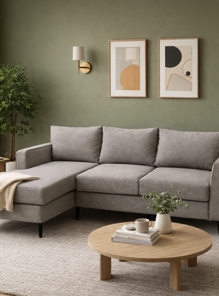 light gray fabric sectional sofa, highlighting the textured upholstery, plush back cushion, and clean stitched seams under soft, even lighting.