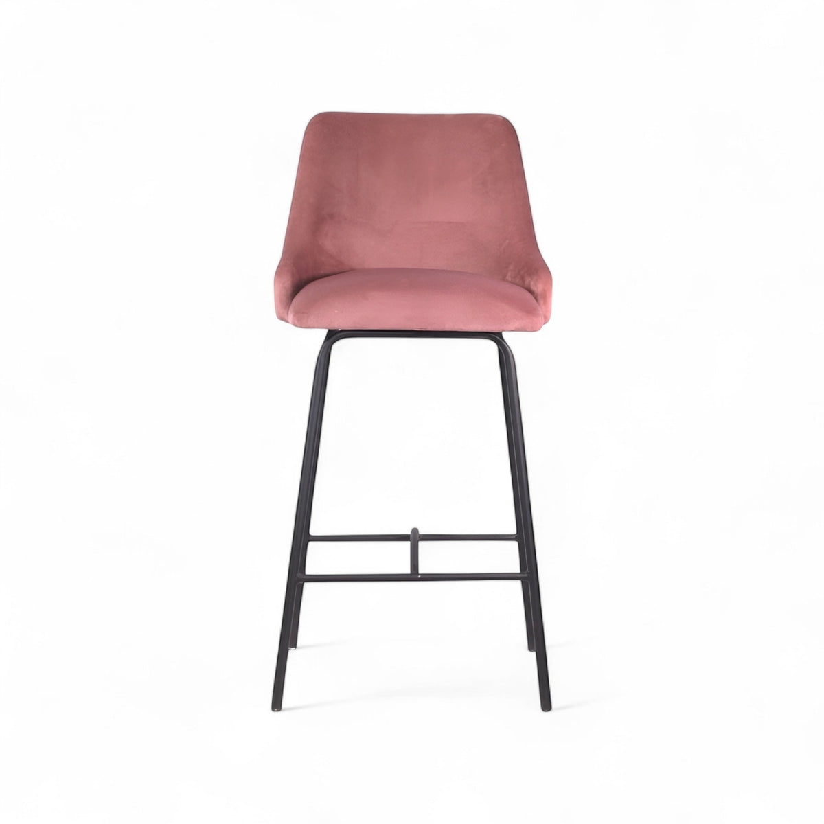 Modern bar stool with a high backrest and seat upholstered in blush pink velvet, featuring button-tufted detailing and slim black metal legs with a built-in footrest, ideal for kitchen islands or contemporary bar spaces