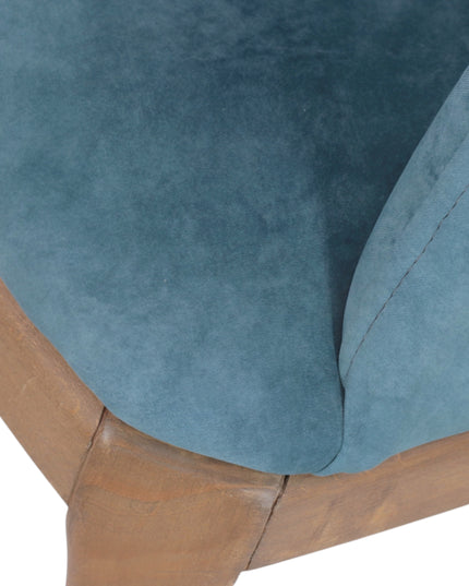 Contemporary dining chair with soft blue upholstery and natural wood legs — perfect for modern dining rooms, boutique cafés, or elegant home offices.
