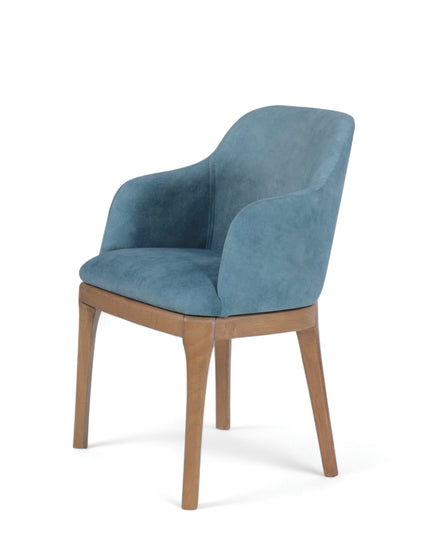 Contemporary dining chair with soft blue upholstery and natural wood legs — perfect for modern dining rooms, boutique cafés, or elegant home offices.