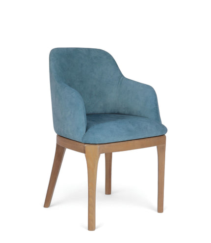 Contemporary dining chair with soft blue upholstery and natural wood legs — perfect for modern dining rooms, boutique cafés, or elegant home offices.