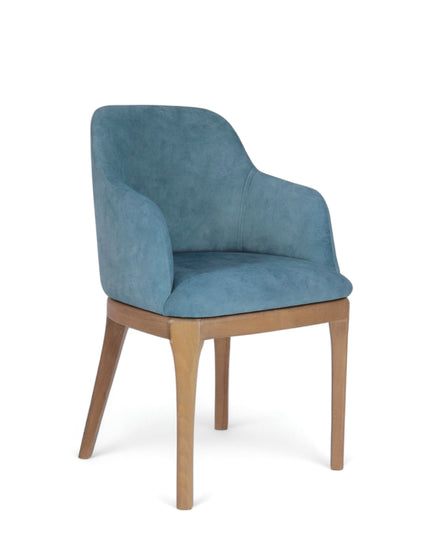 Contemporary dining chair with soft blue upholstery and natural wood legs — perfect for modern dining rooms, boutique cafés, or elegant home offices.