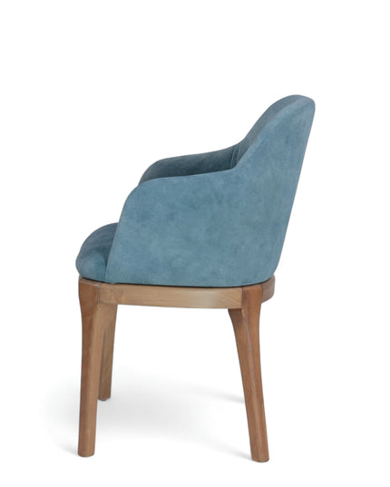 Contemporary dining chair with soft blue upholstery and natural wood legs — perfect for modern dining rooms, boutique cafés, or elegant home offices.