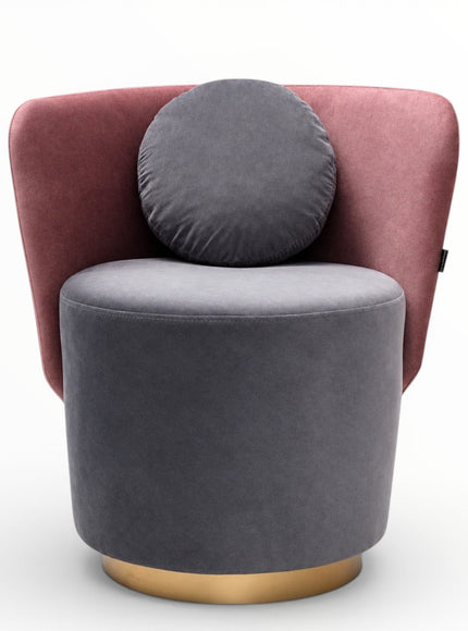 A modern accent chair featuring a dusty rose velvet backrest, a cylindrical dark gray velvet seat and matching round back cushion, and a gold-finished metal base, shown against a plain white background.
