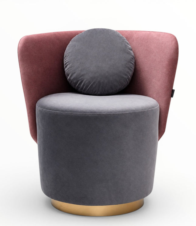 A modern accent chair featuring a dusty rose velvet backrest, a cylindrical dark gray velvet seat and matching round back cushion, and a gold-finished metal base, shown against a plain white background.