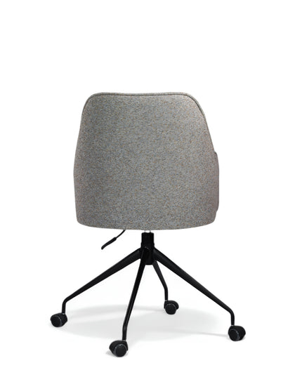 Wicky Office Chair in soft grey upholstery with high back, curved armrests, black metal base, and five smooth-rolling casters; shown from front view.