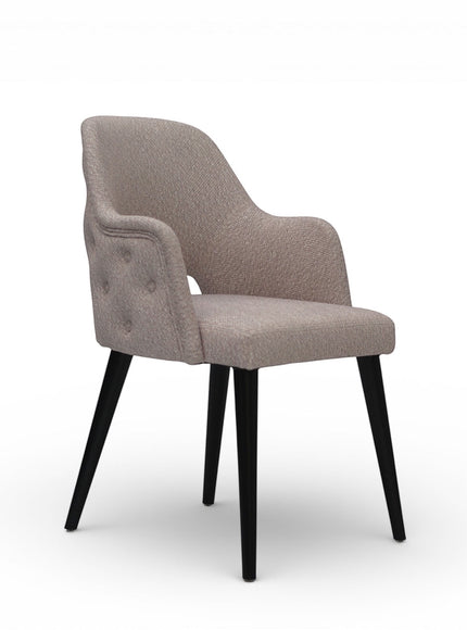 Beige upholstered chair with black legs on a white background