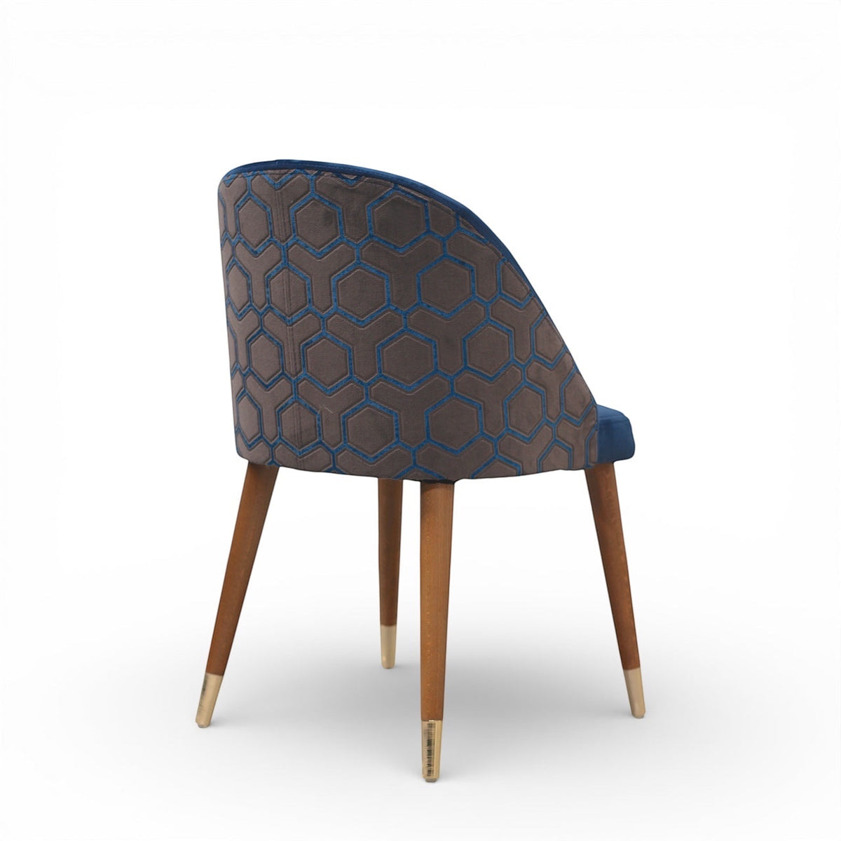 Chair with patterned backrest and wooden legs on a white background