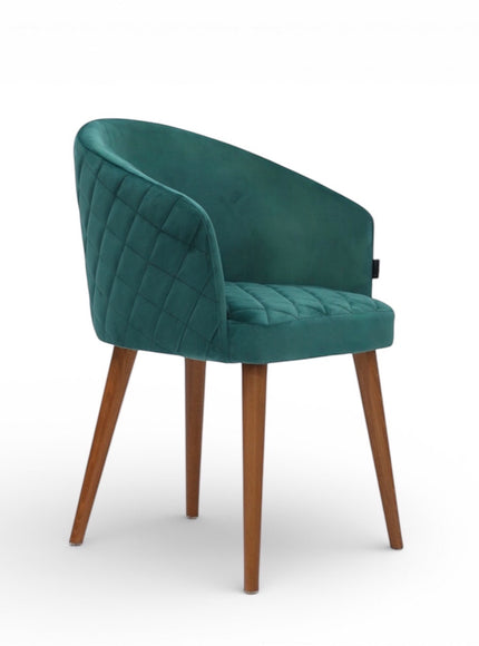 Teal velvet chair with wooden legs on a white background