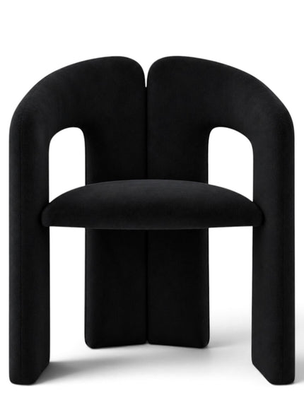 A modern black velvet dining chair with a unique split backrest and wide block legs, shown from the front on a white background.