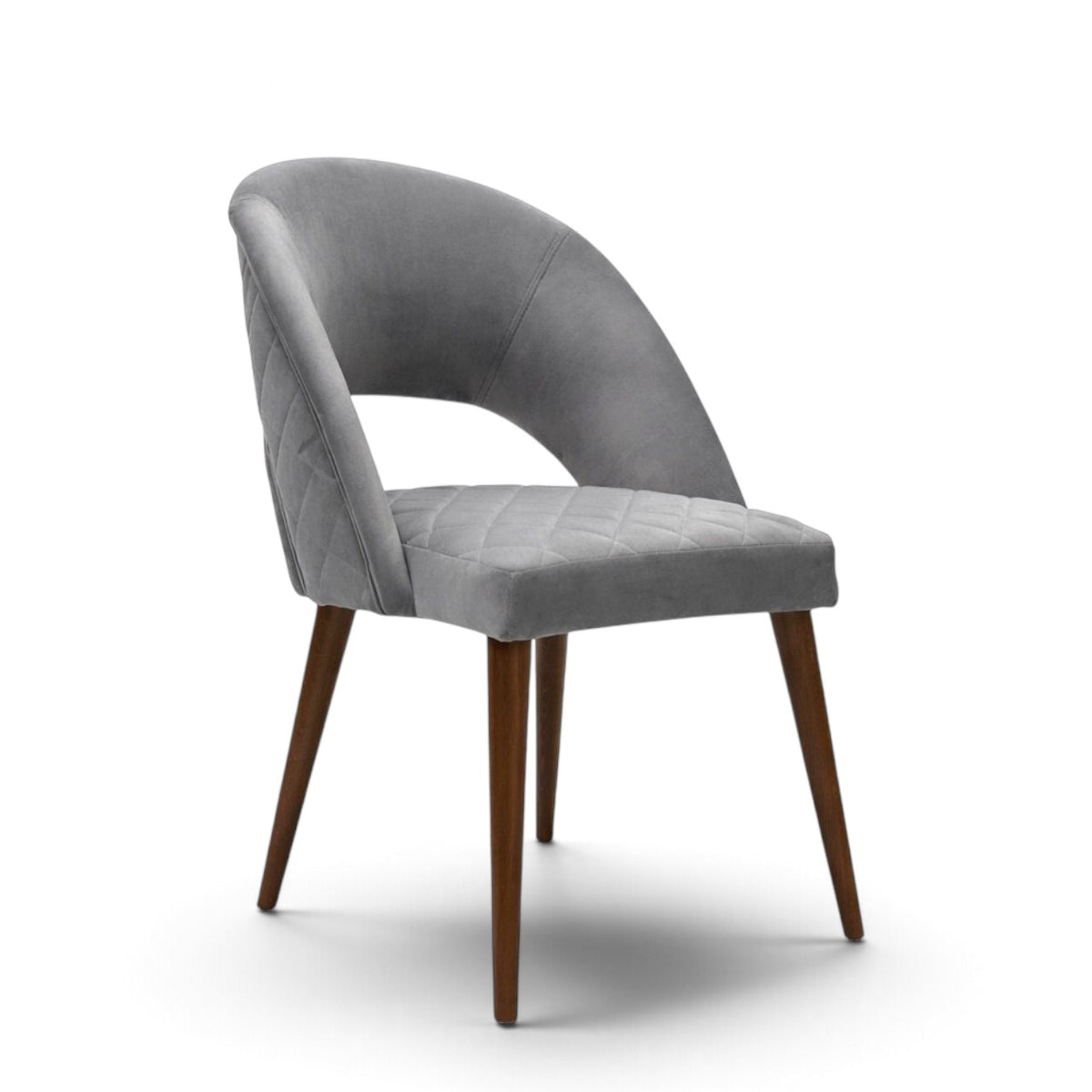 Argent grey upholstered dining chair with curved open backrest, diamond-quilted seat and brown wooden legs.
