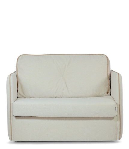 Modern white convertible armchair with soft upholstery and minimalist design