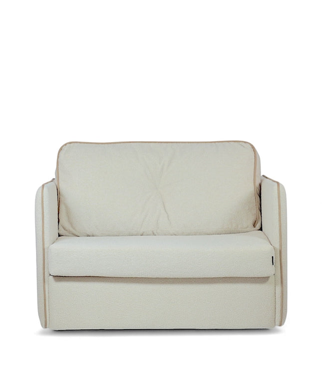 Modern white convertible armchair with soft upholstery and minimalist design