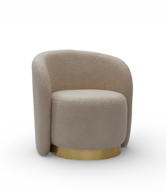 Beige armchair with gold base on a white background