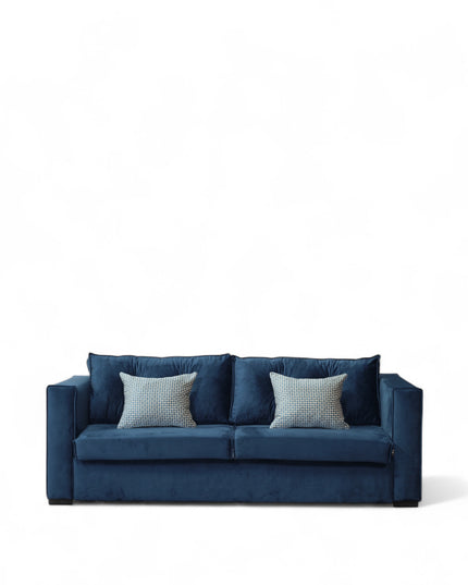 Blue sofa with two cushions on a white background
