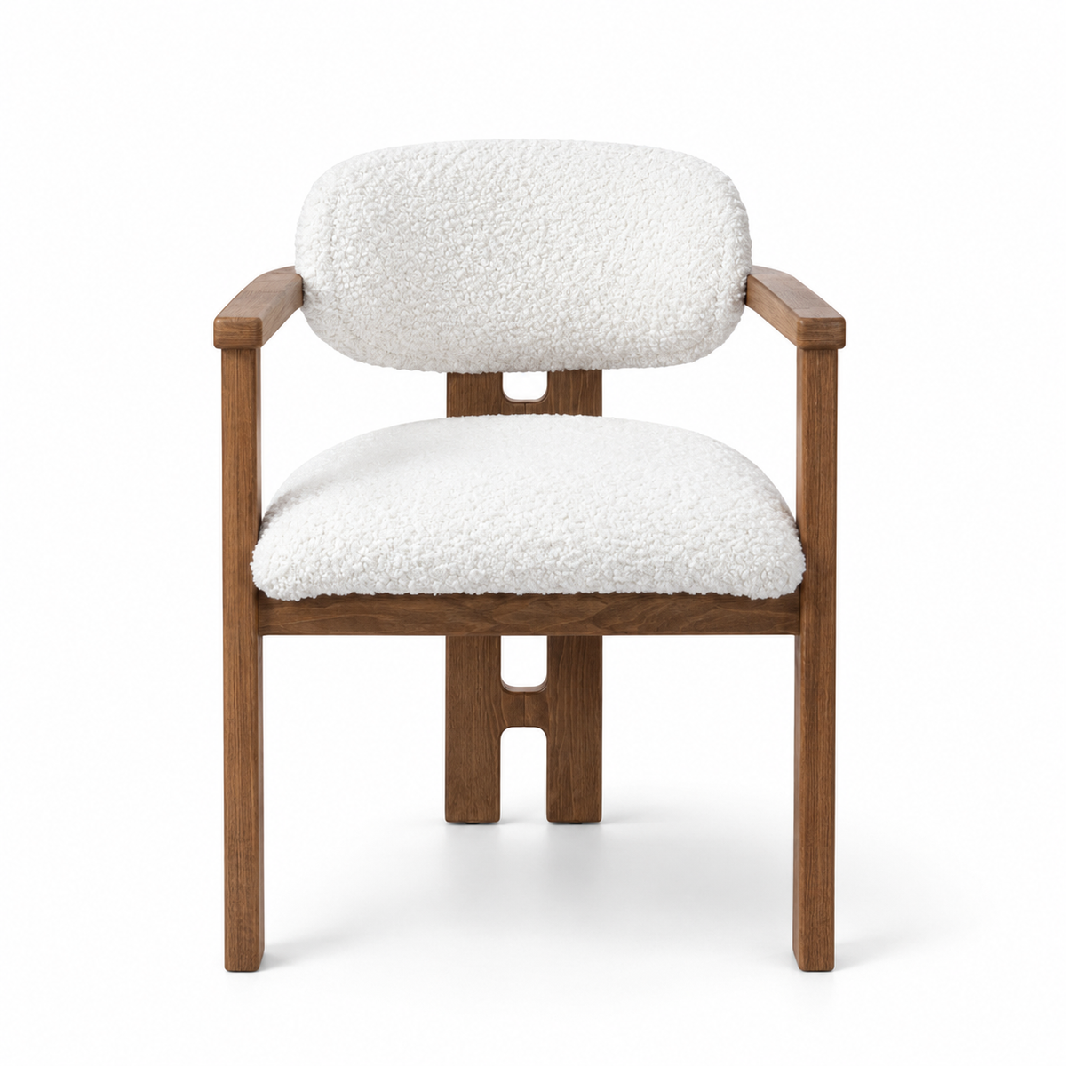 A modern accent chair featuring a warm brown wooden frame with a unique cutout design on the legs, paired with plush white bouclé fabric cushions on the seat and backrest, shown against a solid white background.